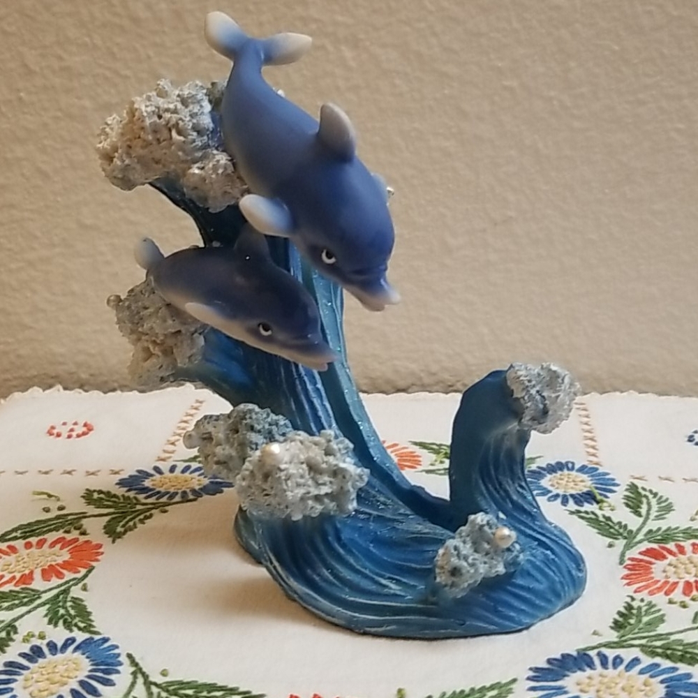 Plaster dolphin decorative piece